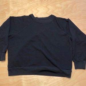 Black reformation crew sweatshirt, maybe worn once in a size medium.